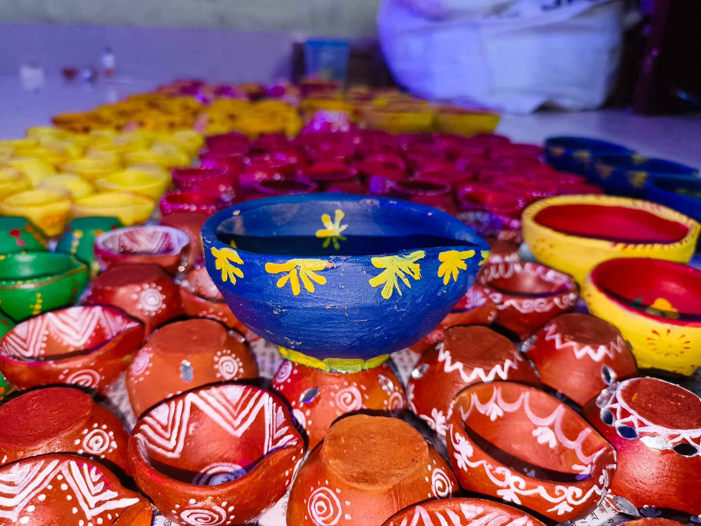 Blue - Yellow handpainted medium sized clay diyas - Set of 4